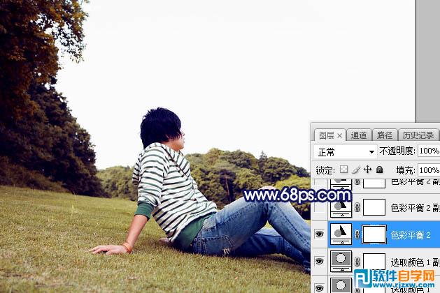 PS給唯美草坪上的人物加些紫色霞光